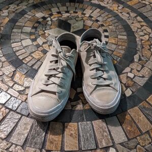 Beige leather converse